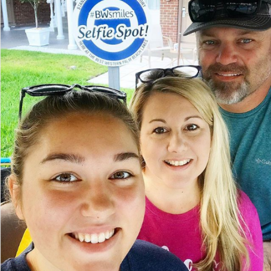 Three people taking a selfie