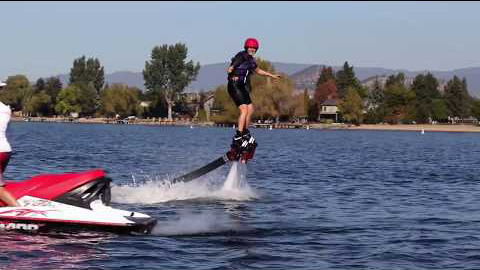 Man enjoying water sports on lake