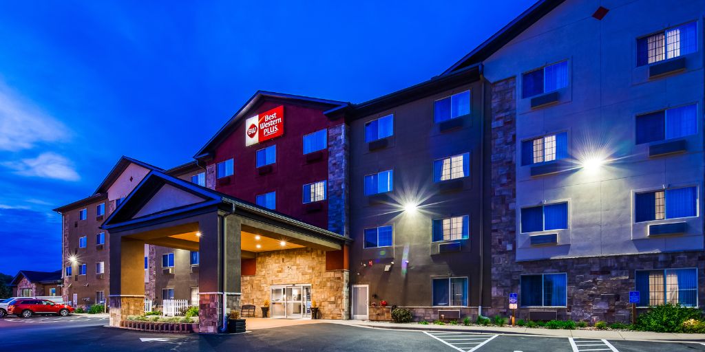 A modern Best Western Plus hotel exterior at dusk