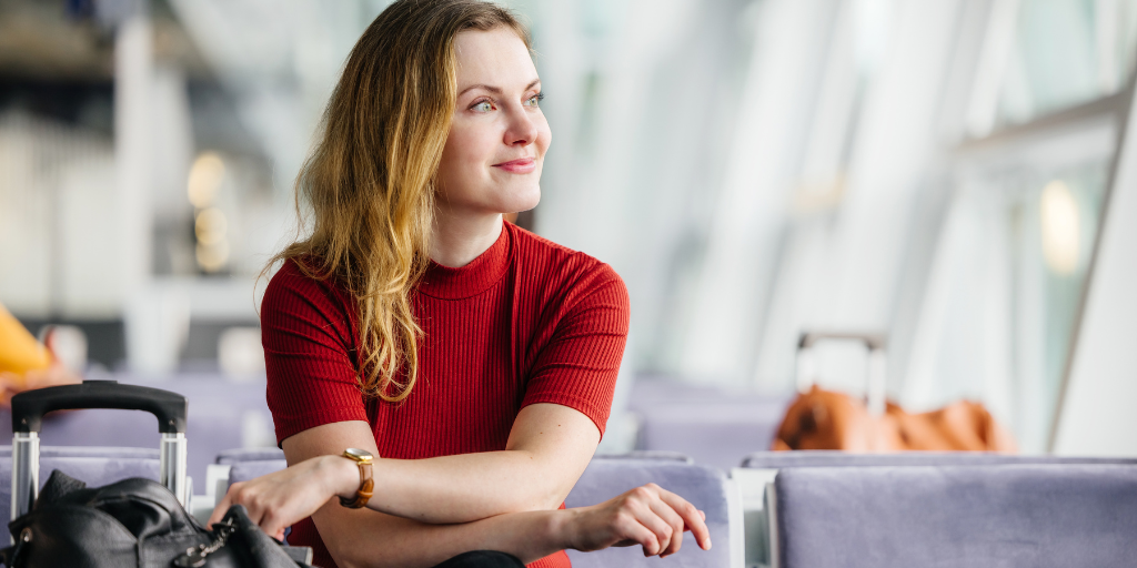 Woman smiling in an airport